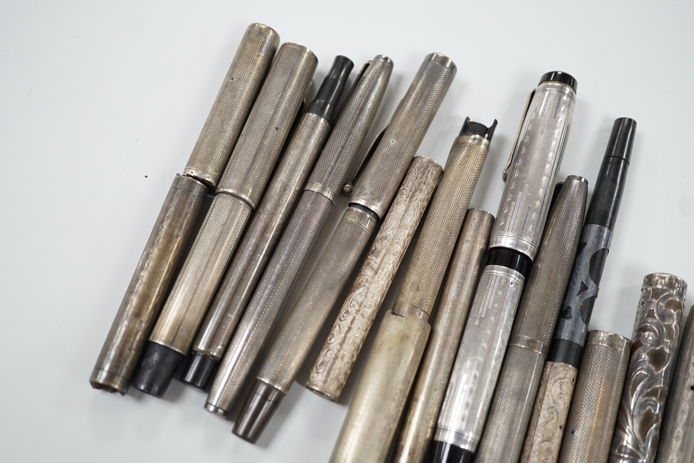 Silver fountain pens and parts